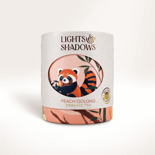 Peach Oolong oolong tea with peach in a Lights & Shadows gift box with a red panda