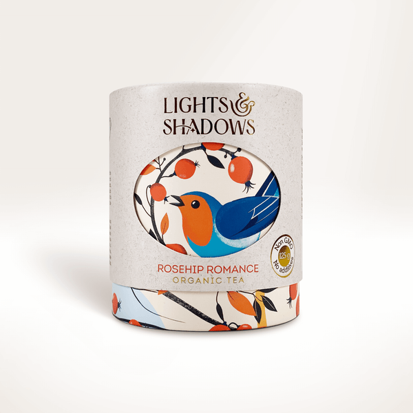 Rosehip Romance rosehip and berry fruit tea in a Lights & Shadows gift box with a robin on a rosehip branch